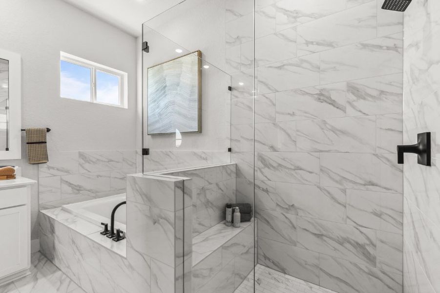 A bathroom with a glass shower.