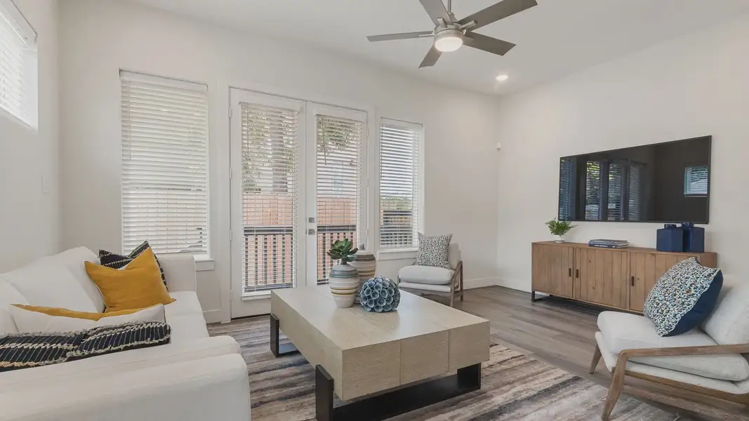 Furnished interior in a model home at Shady Acres in Houston (Image 8).