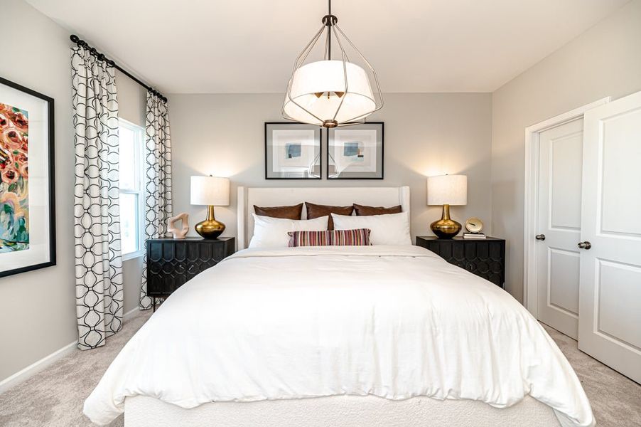 Furnished interior in a model home at Fords Reach in Bolivia (Image 15).