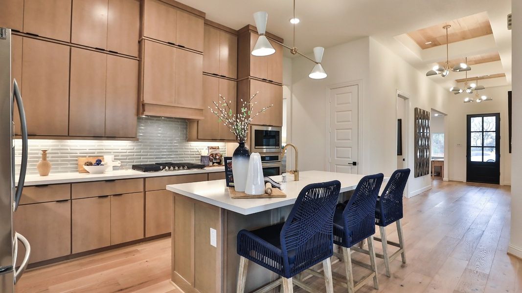 Furnished interior in a model home at Wildrye in Waller (Image 5).