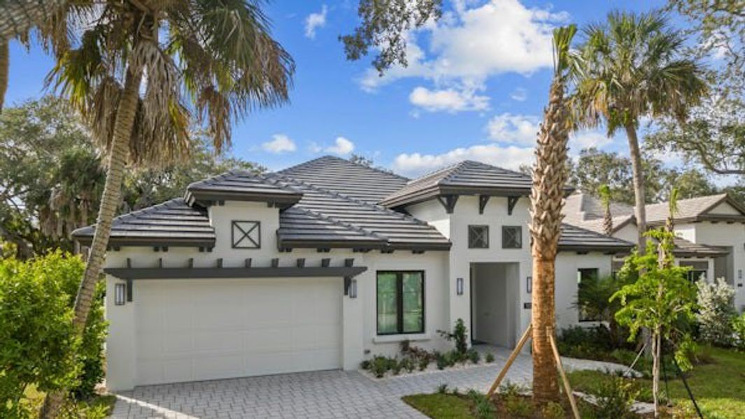 Front exterior of a home in the Seaglass community, located in Vero Beach, FL (Image 62).
