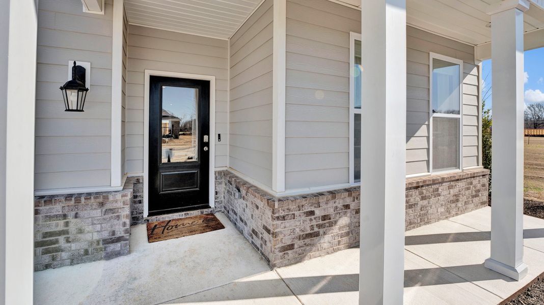 Front exterior of a home in the The Orchard community, located in Millington, TN (Image 2).