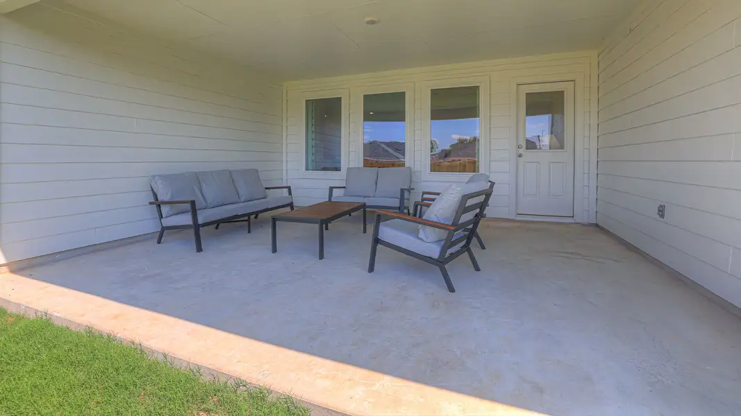 Furnished interior in a model home at Sonoma Oaks in Fredericksburg (Image 39).