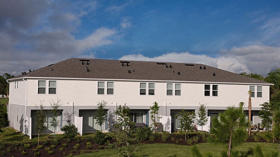 Front exterior of a home in the The Townhomes at Skye Ranch community, located in Sarasota, FL (Image 17).