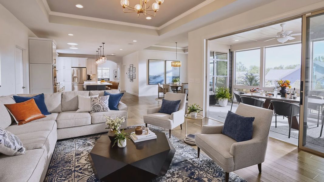 Furnished interior in a model home at The Courtyards at Holly Grove in Holly Springs (Image 6).