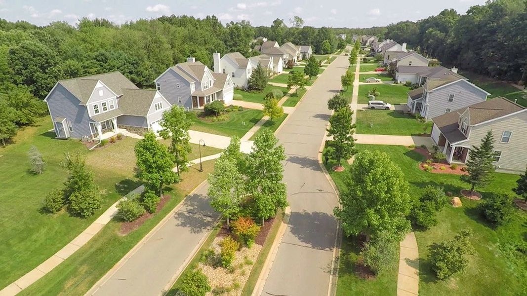 Aerial view of the Preserve at Magnolia Park community in Jackson, MI, showing layout and nearby surroundings (Image 1). Aerial view of the Preserve at Magnolia Park community in Jackson, MI, showing layout and nearby surroundings (Image 1).
