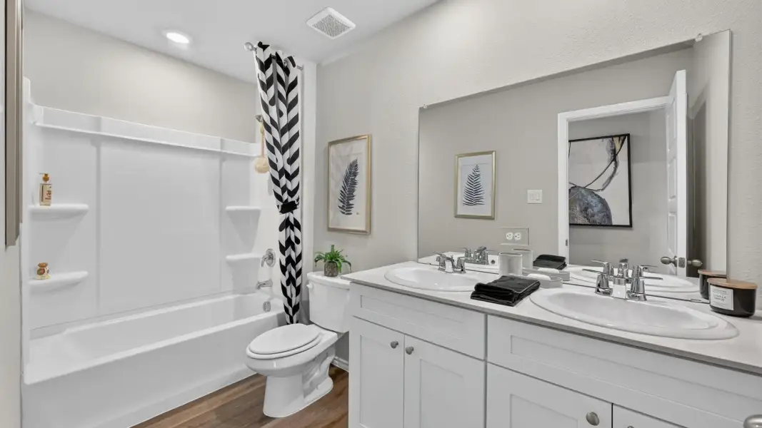 Furnished interior in a model home at The Wells in Mineral Wells (Image 32).
