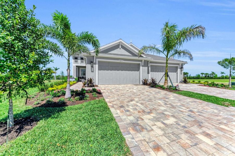 Front exterior of a home in the Reflection Villas at Watercolor Place community, located in Bradenton, FL (Image 21).
