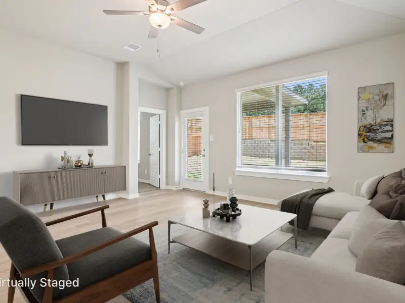 Furnished interior in a model home at Massey Oaks - Estate Series in Pearland (Image 4).