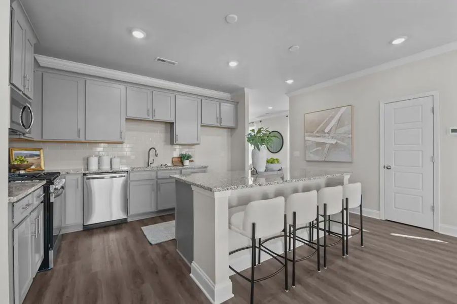 Furnished interior in a model home at Kinsley in Wake Forest (Image 15).