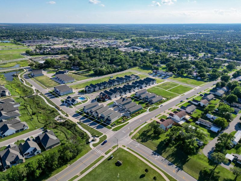 Aerial view of the Heritage Commons community in Andover, KS, showing layout and nearby surroundings (Image 12). Aerial view of the Heritage Commons community in Andover, KS, showing layout and nearby surroundings (Image 12).