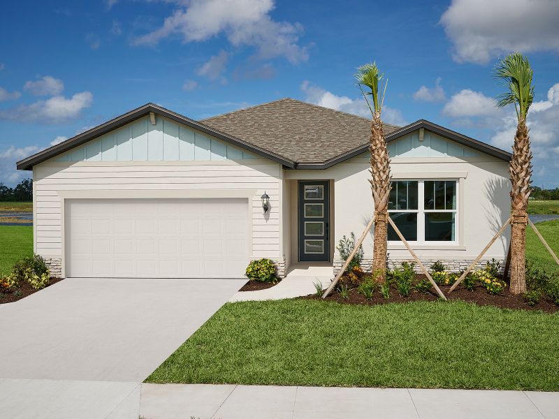 Front exterior of a home in the Magnolia Bay - Reserve Series community, located in Nokomis, FL (Image 3).