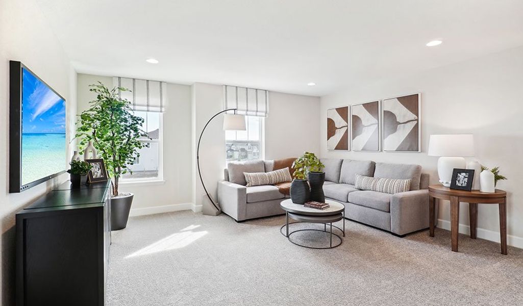 Furnished interior in a model home at Prairie Song in Windsor (Image 7).