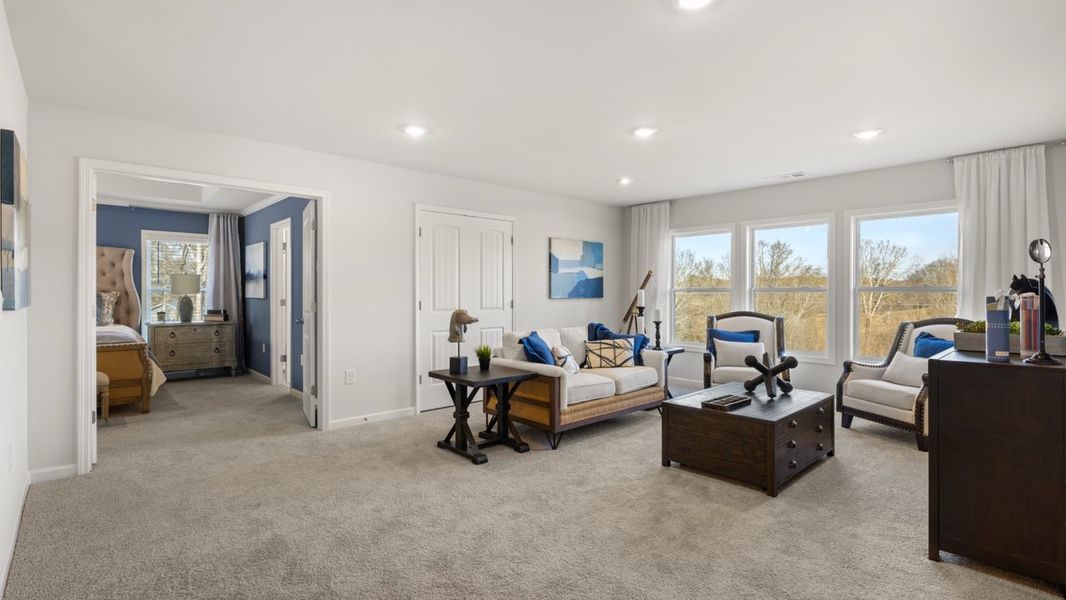 Furnished interior in a model home at Thalley Creek Estates in Cumming (Image 16).