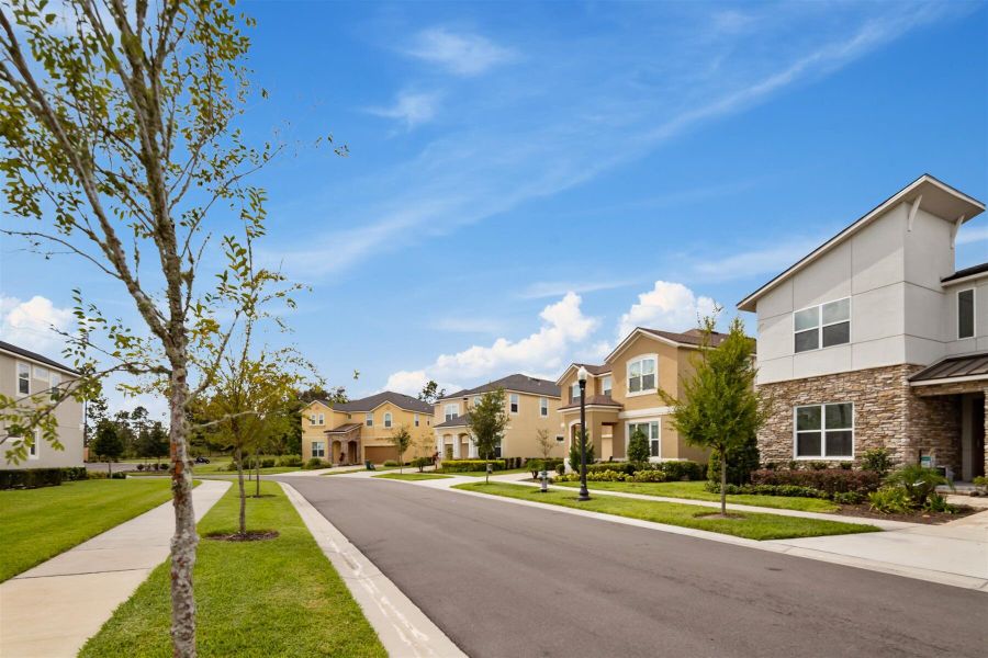 Front exterior of a home in the Solara Resort community, located in Kissimmee, FL (Image 3).