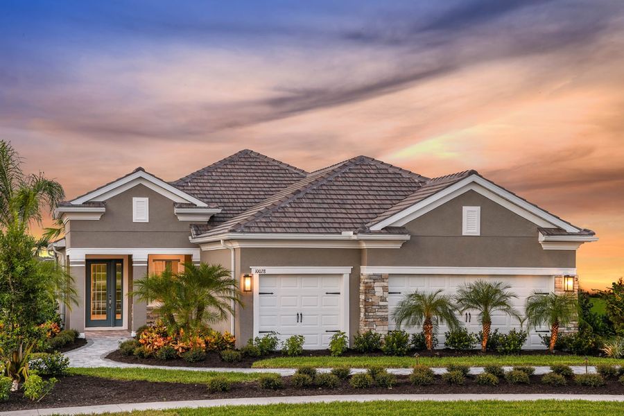 Front exterior of a home in the Grand Park community, located in Sarasota, FL (Image 16).