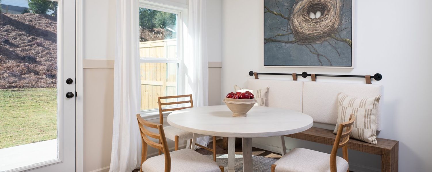 Furnished interior in a model home at Eastlyn Crossing - Townhomes in Flowery Branch (Image 9). Furnished interior in a model home at Eastlyn Crossing - Townhomes in Flowery Branch (Image 9).