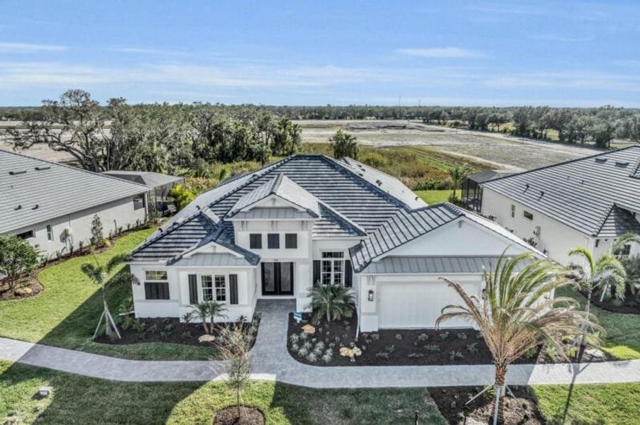 Front exterior of a home in the River Preserve Estates community, located in Parrish, FL (Image 16). Front exterior of a home in the River Preserve Estates community, located in Parrish, FL (Image 16).