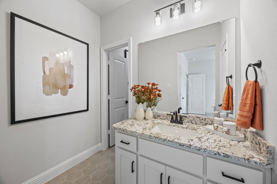 Furnished interior in a model home at Myrtle Creek in Waxahachie (Image 8).