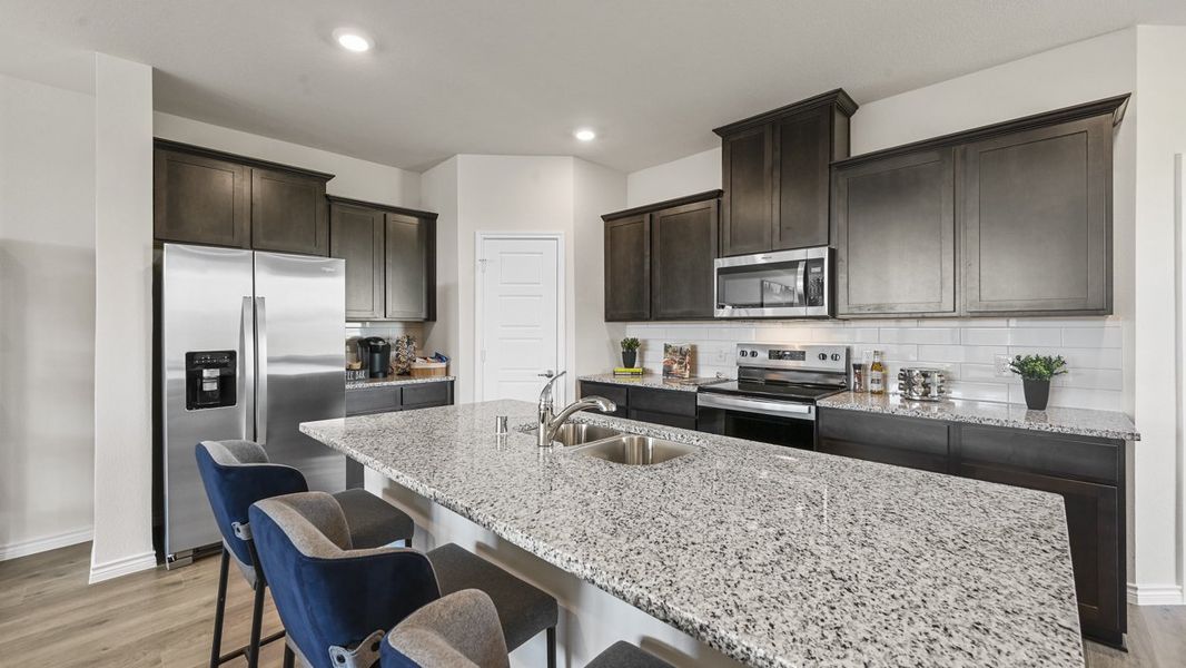 Furnished interior in a model home at The Villages of Hurricane Creek Townhomes in Anna (Image 23). Furnished interior in a model home at The Villages of Hurricane Creek Townhomes in Anna (Image 23).