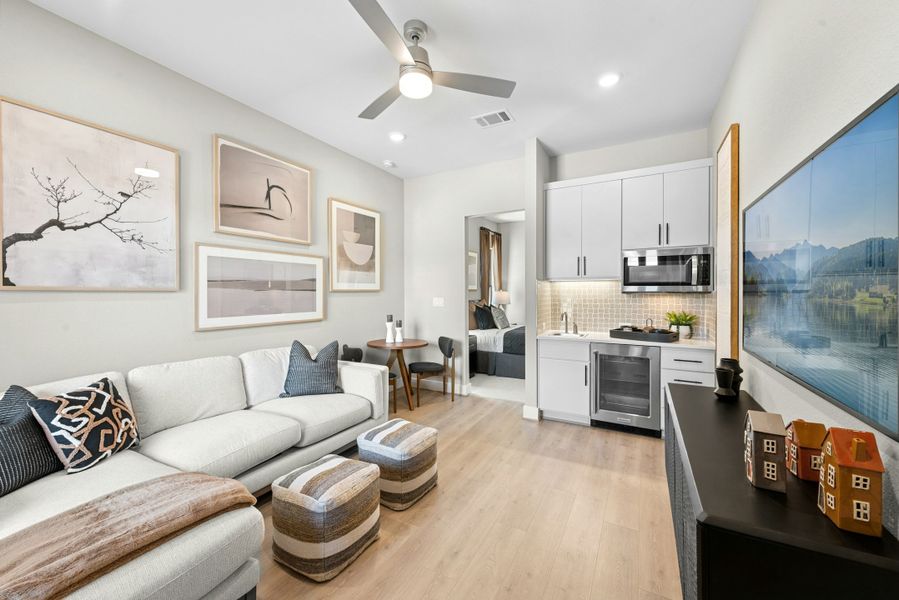 Furnished interior in a model home at Caliterra in Dripping Springs (Image 49).