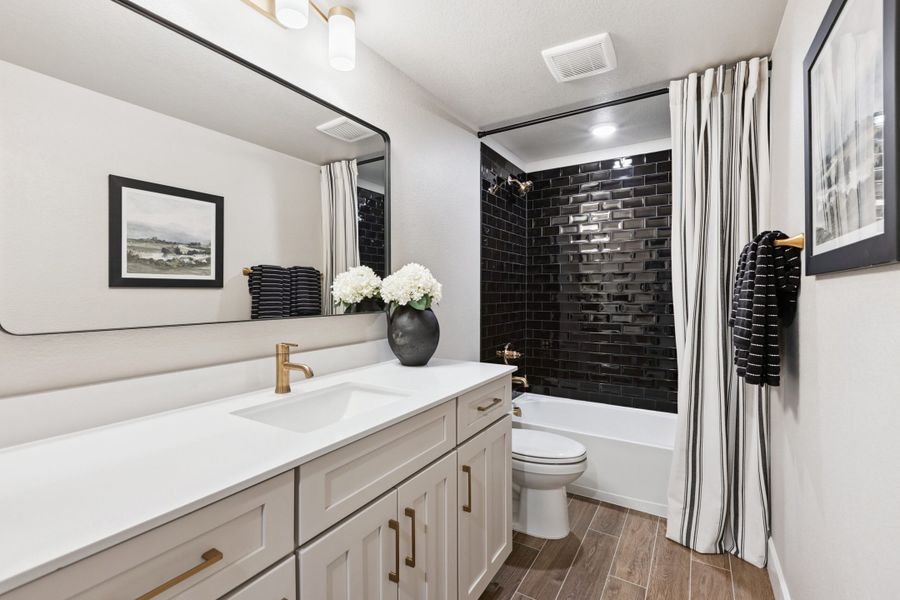 Furnished interior in a model home at Highlands Preserve in Mead (Image 30).