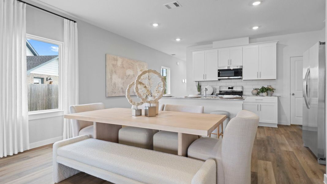 Furnished interior in a model home at Caldwell Crossing in Iowa Colony (Image 20).
