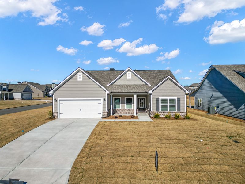 Front exterior of a home in the Harmony Farms community, located in Eatonton, GA (Image 7). Front exterior of a home in the Harmony Farms community, located in Eatonton, GA (Image 7).