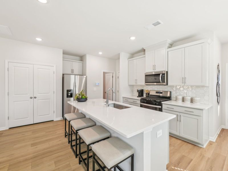 Furnished interior in a model home at Oakwood Townes in Mebane (Image 4).