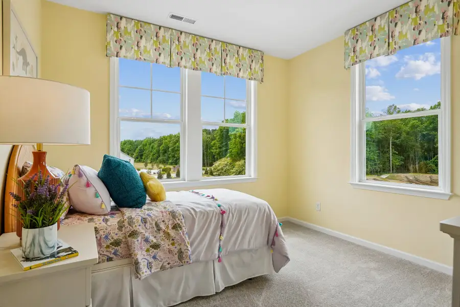 Furnished interior in a model home at South Lake Townes at Flowers Plantation in Clayton (Image 42).