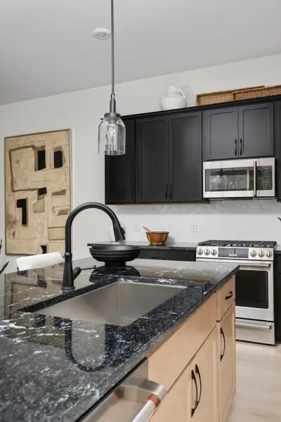 Furnished interior in a model home at Symphony in Montgomery (Image 37).