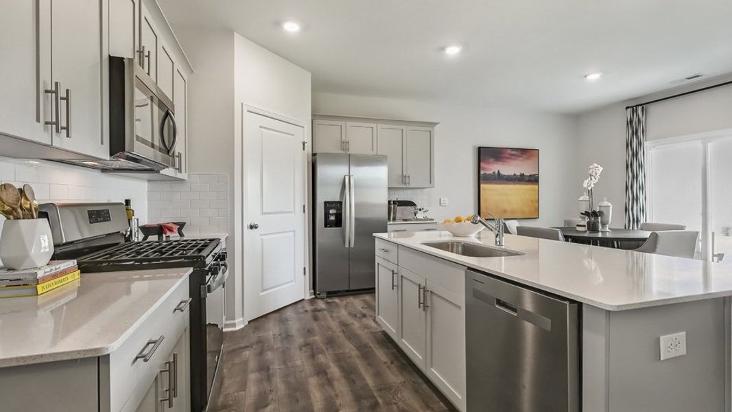 Furnished interior in a model home at The Reserve at Prestleigh in Wake Forest (Image 55).
