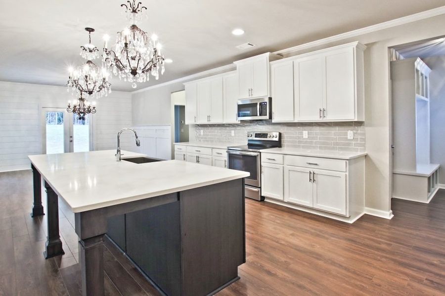 Furnished interior in a model home at Rockwell Farms in Winder (Image 16).