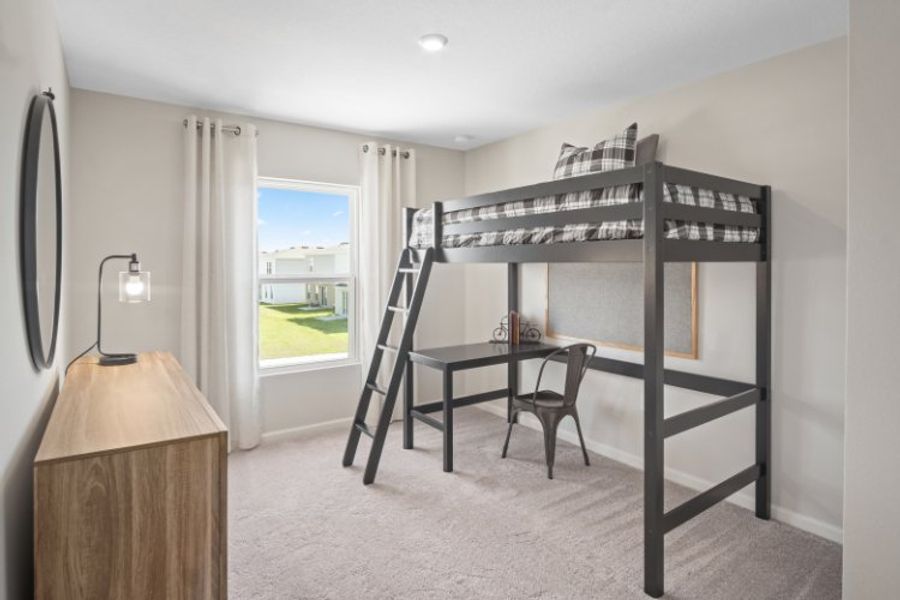 A room with a table and a chair.