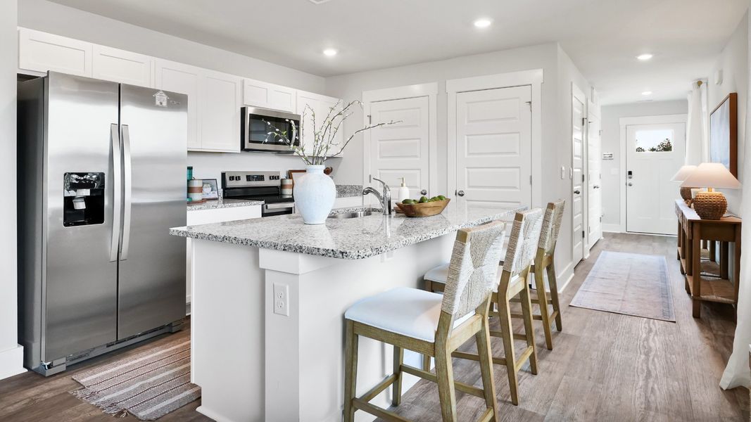 Furnished interior in a model home at Saltgrass Landing in Winnabow (Image 6).