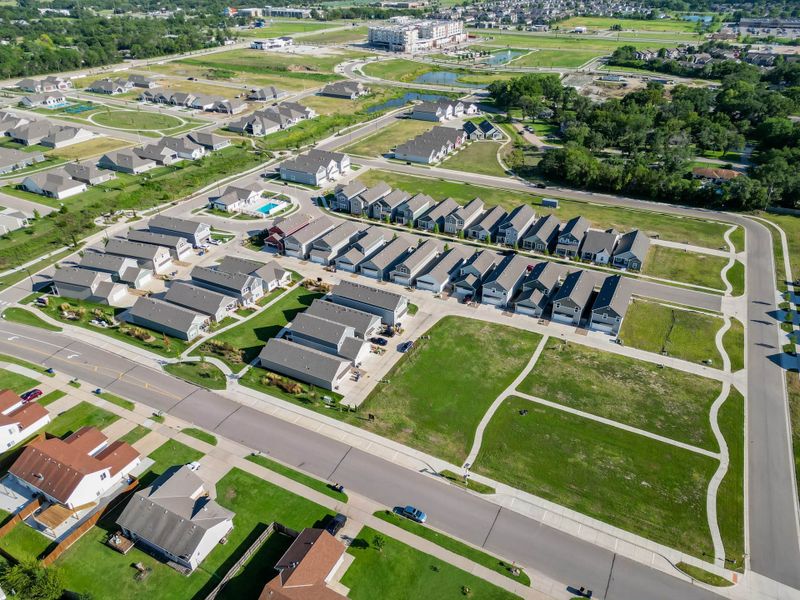 Aerial view of the Heritage Commons community in Andover, KS, showing layout and nearby surroundings (Image 25). Aerial view of the Heritage Commons community in Andover, KS, showing layout and nearby surroundings (Image 25).