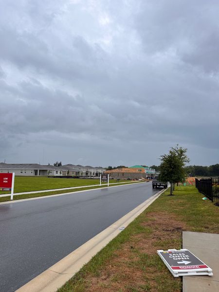 Cozy community with ongoing construction in Seasons at Heritage Square by Richmond American Homes (Haines City, FL).