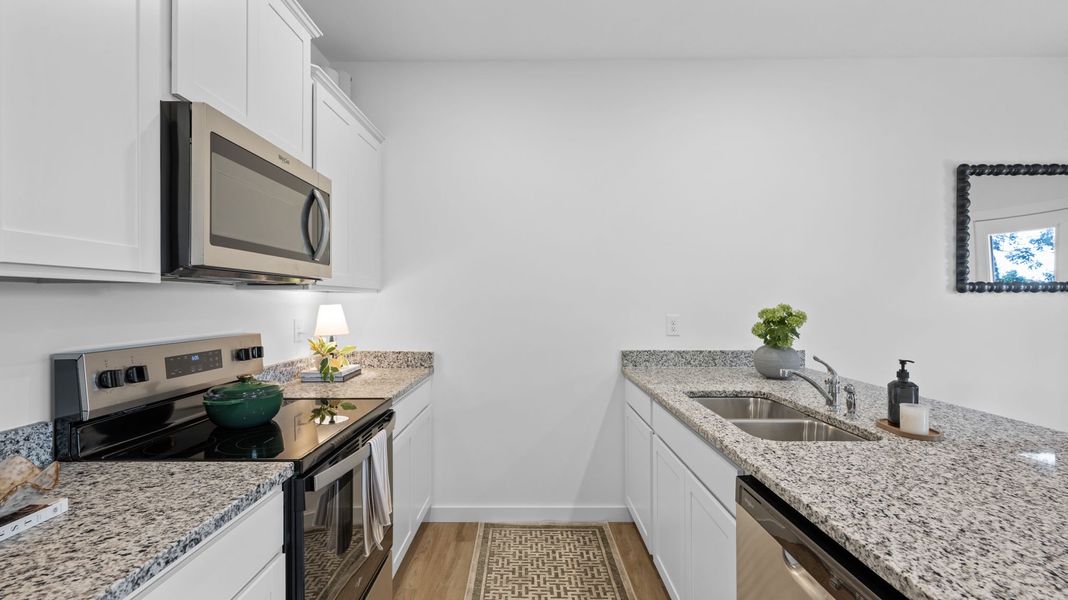Furnished interior in a model home at Belcourt Landing in Cleveland (Image 34). Furnished interior in a model home at Belcourt Landing in Cleveland (Image 34).