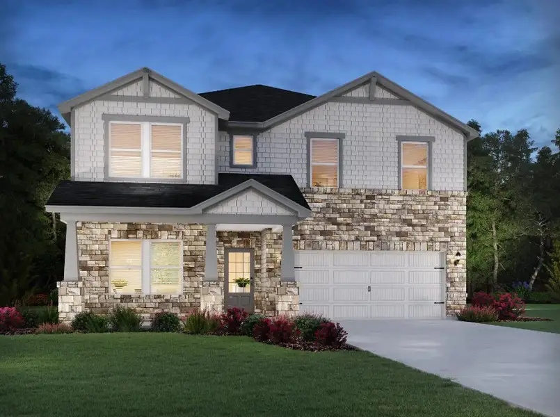 Front exterior of a home in the Vines at Mill Creek - Estate Series community, located in Braselton, GA (Image 9).