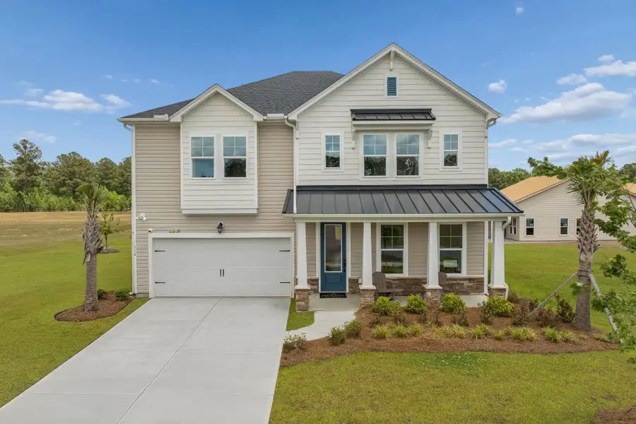 Front exterior of a home in the The Groves of Berkeley community, located in Moncks Corner, SC (Image 3). Front exterior of a home in the The Groves of Berkeley community, located in Moncks Corner, SC (Image 3).