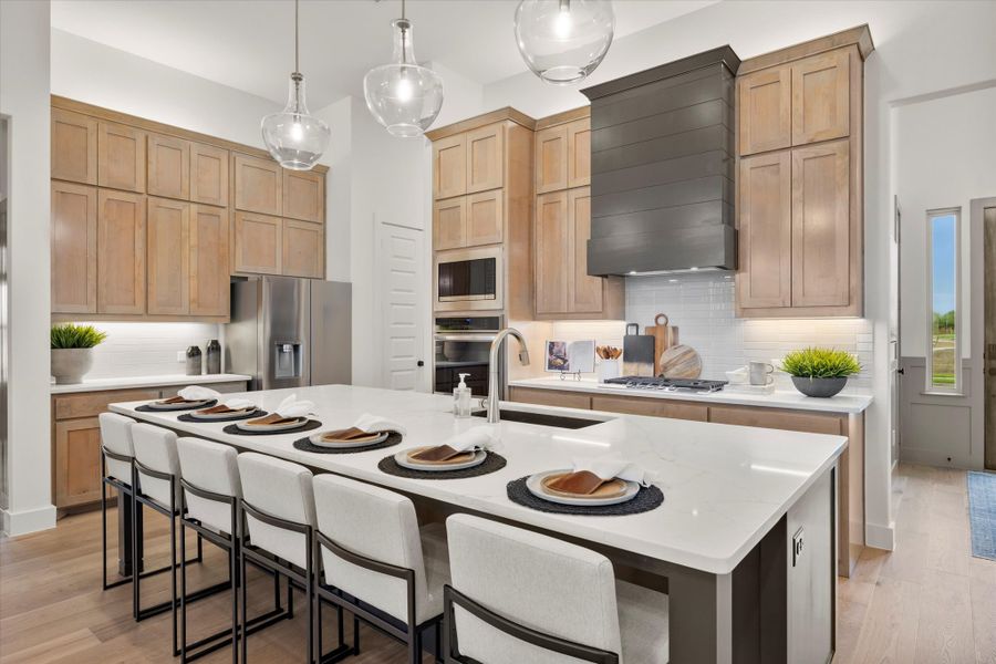 Furnished interior in a model home at River Ranch in Van Alstyne (Image 9).