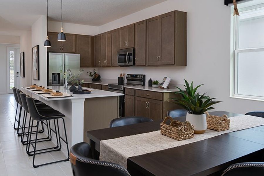 Furnished interior in a model home at Liberty Station Single Family in Orange City (Image 4). Furnished interior in a model home at Liberty Station Single Family in Orange City (Image 4).