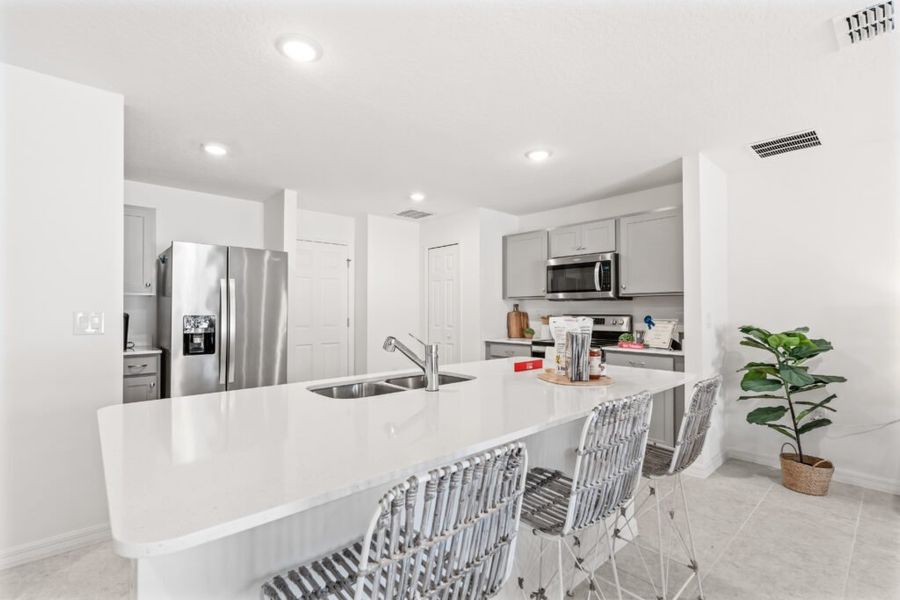 Furnished interior in a model home at Palm Bay in Palm Bay (Image 37).