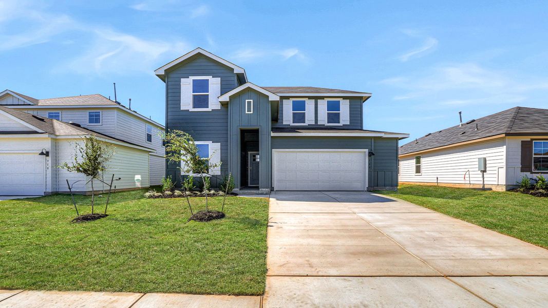Front exterior of a home in the Paramount community, located in Kyle, TX (Image 4). Front exterior of a home in the Paramount community, located in Kyle, TX (Image 4).