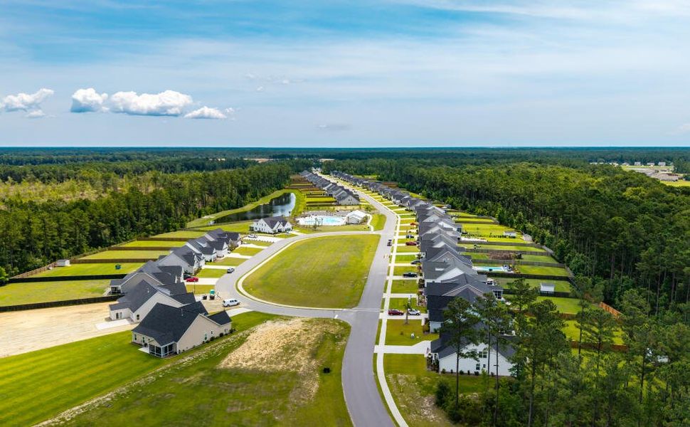Aerial view of the The Enclave at French Quarter Creek community in Huger, SC, showing layout and nearby surroundings (Image 9).