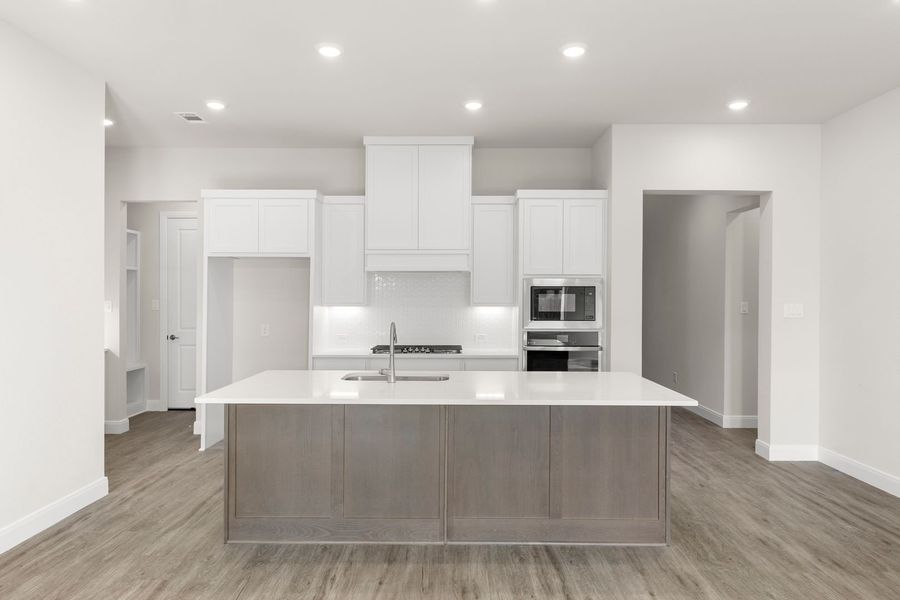 Furnished interior in a model home at West Crossing in Anna (Image 9).