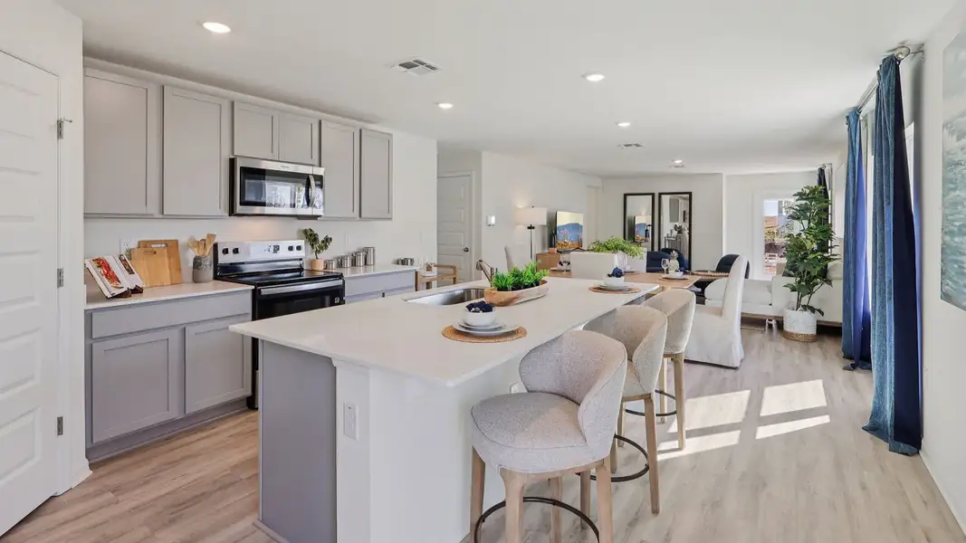 Furnished interior in a model home at Hamilton Bluff in Haines City (Image 2).