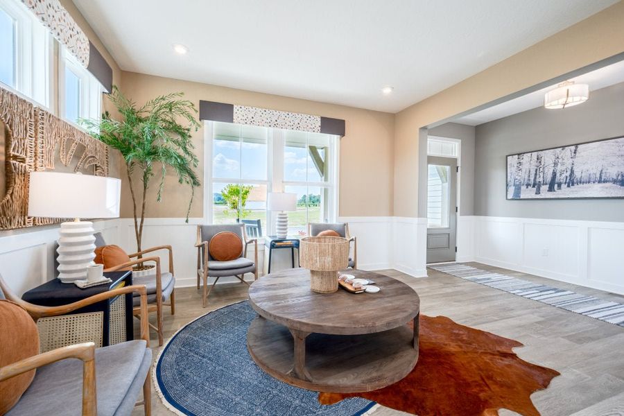 Furnished interior in a model home at Breakfast Point East in Panama City Beach (Image 12).
