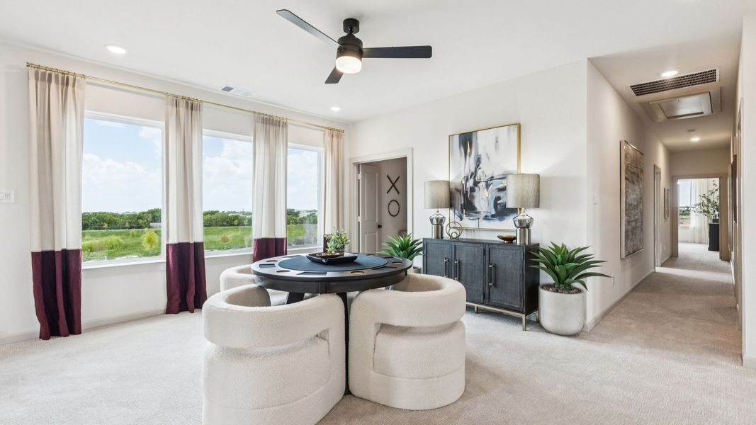 Furnished interior in a model home at The Heights at Uptown in Celina (Image 6).