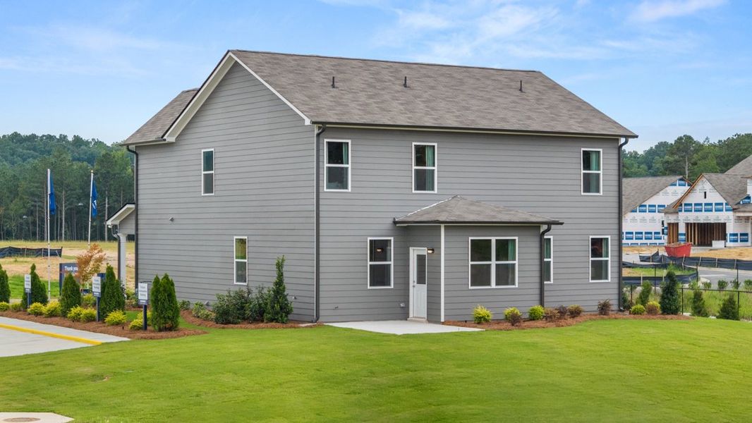 Front exterior of a home in the Fairway 17 at Mirror Lake community, located in Villa Rica, GA (Image 15).